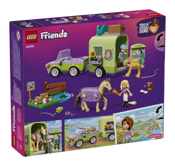 Pferd und Fohlen mit Pferdeanhänger 