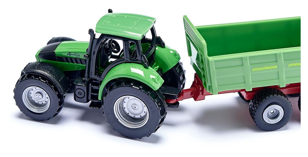 Traktor mit Universalstreuer 