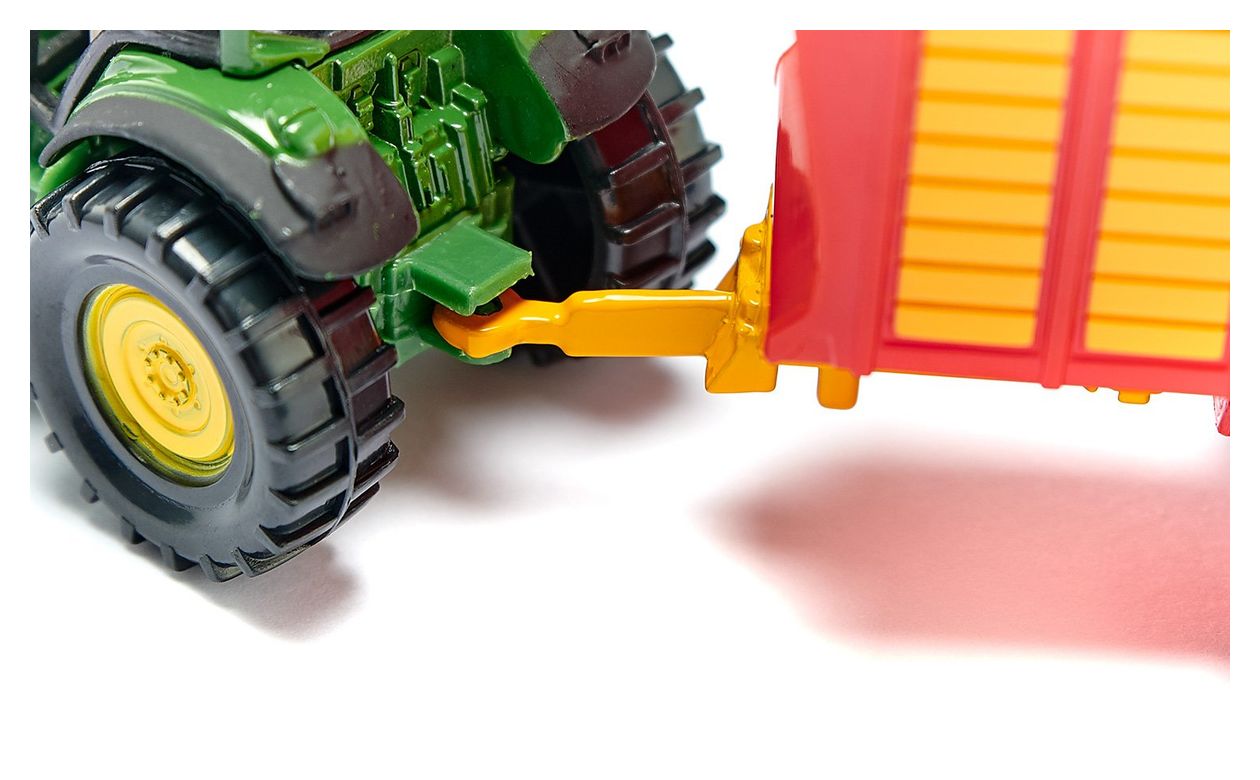 Claas mit Silagewagen 