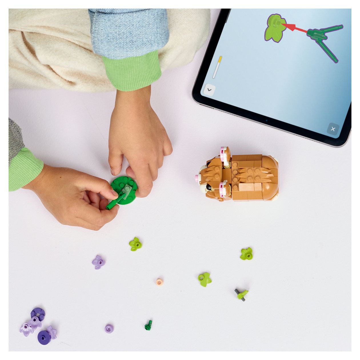 Niedlicher Hamster mit Blume 