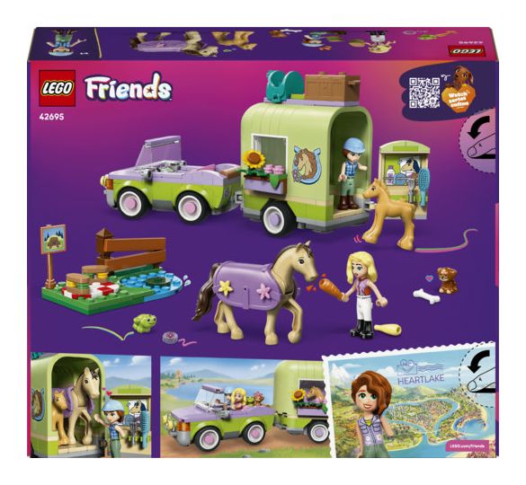 Pferd und Fohlen mit Pferdeanhänger 