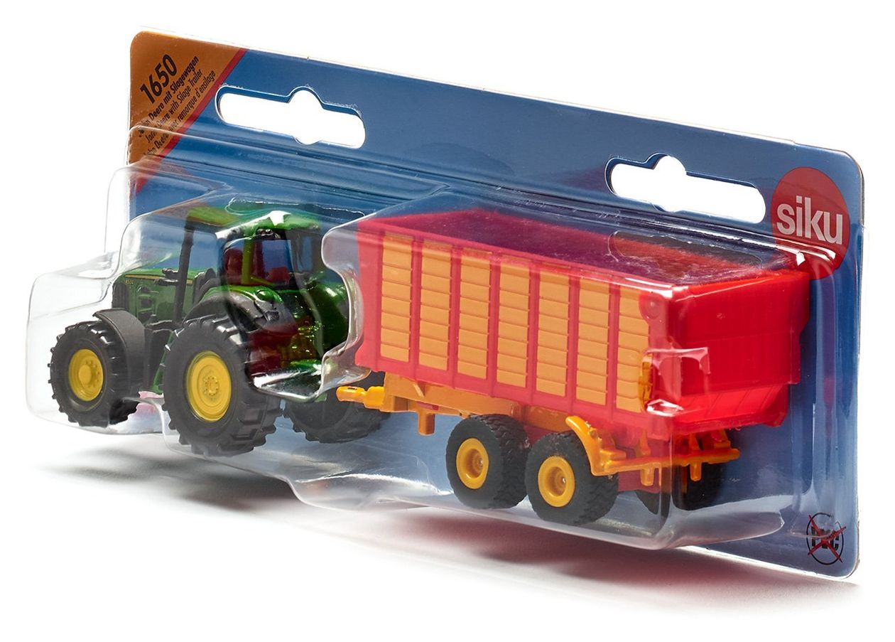 Claas mit Silagewagen 